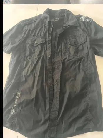 Chemise noir  manche  courte  taille  L