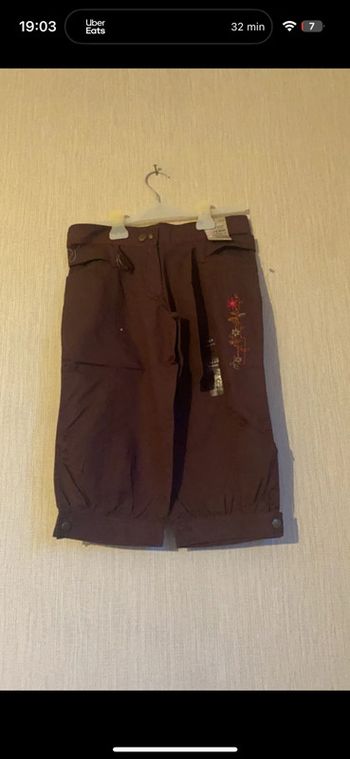 Pantacourt violet neuf 14 ans