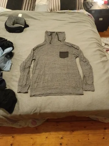Pull col roulé