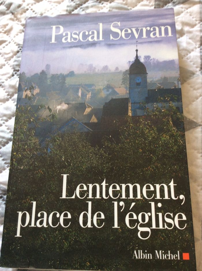Lentement , place de l’église par Pascal Sevran