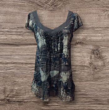 Haut fluide motif tartan déstructuré