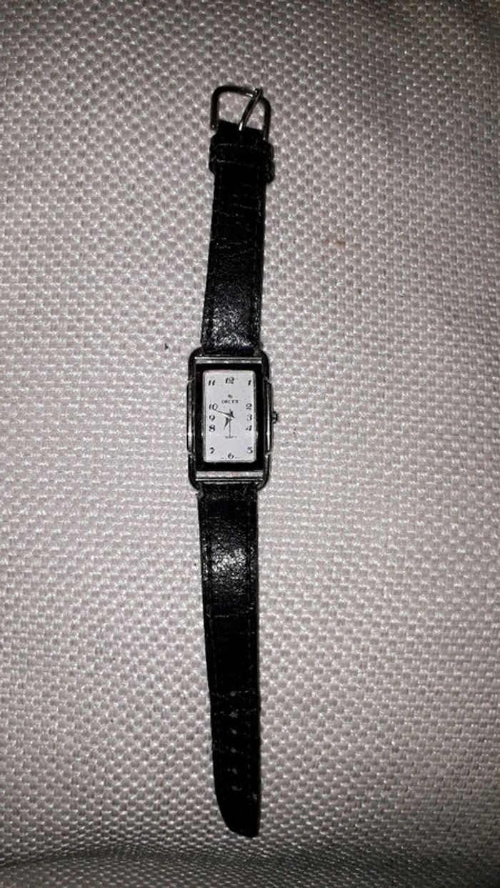 Orlex montre argentée et noire