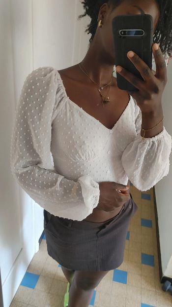 Top décolleté blanche manches longues