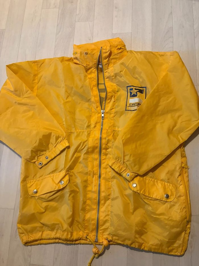 Imperméable camps 12 ans jaune très bon état