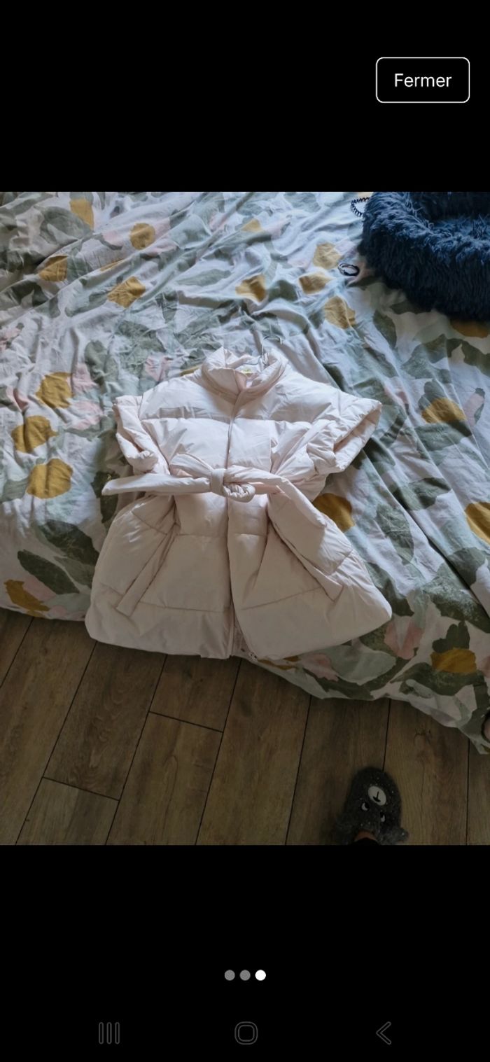 Vends doudoune sans manches