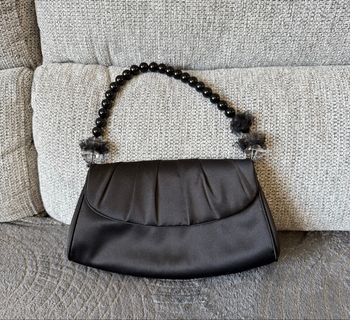 Sac à main pochette noir avec perle un jour ailleurs