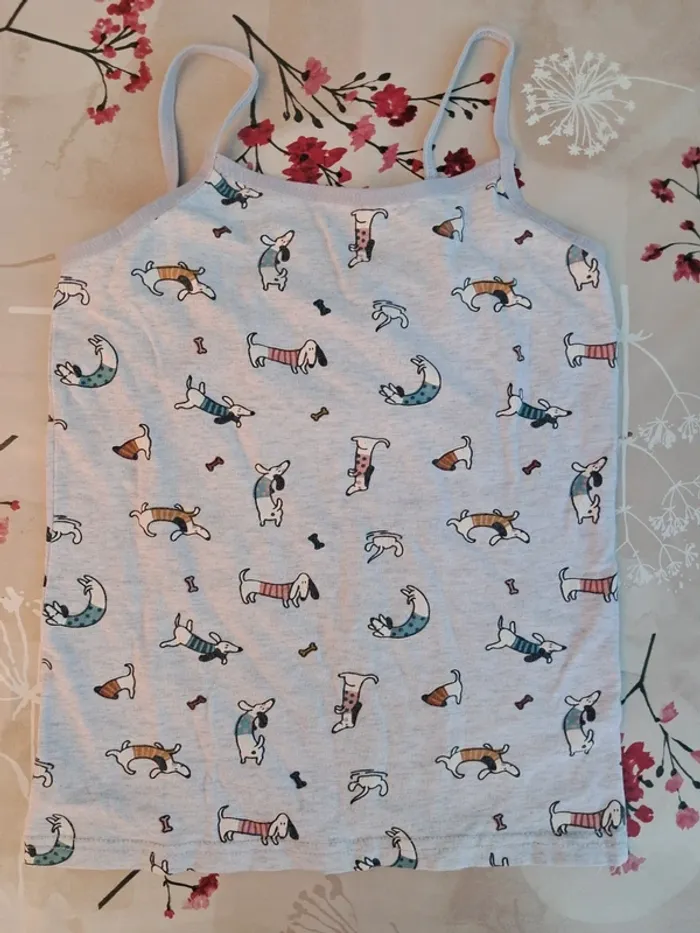 Joli lot de pyjamas, 2 bas 5 hauts - Miraculous, Hello Kitty, marinière, cygne, chiots - T 8-9 ans - photo numéro 4