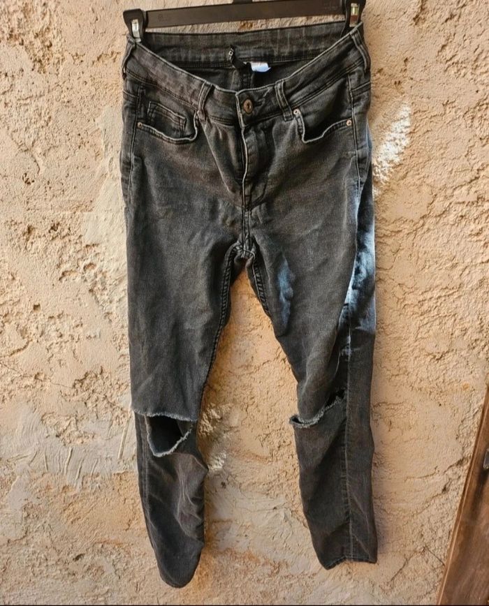 Jean skinny noir troué