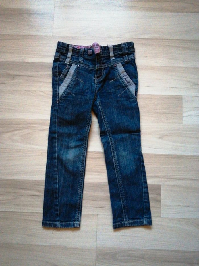 Jean ceinture réglable