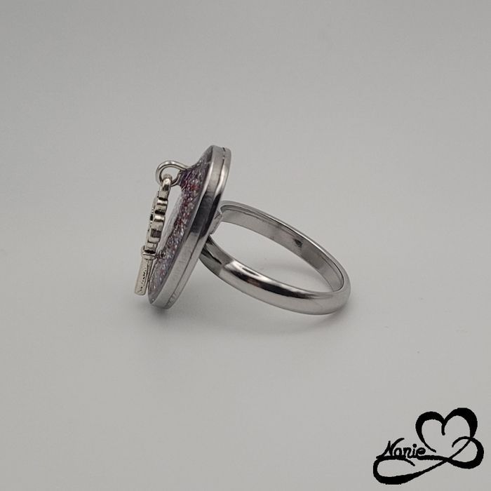 Bague ajustable ovale argentée avec une clé 🔑 - photo numéro 4