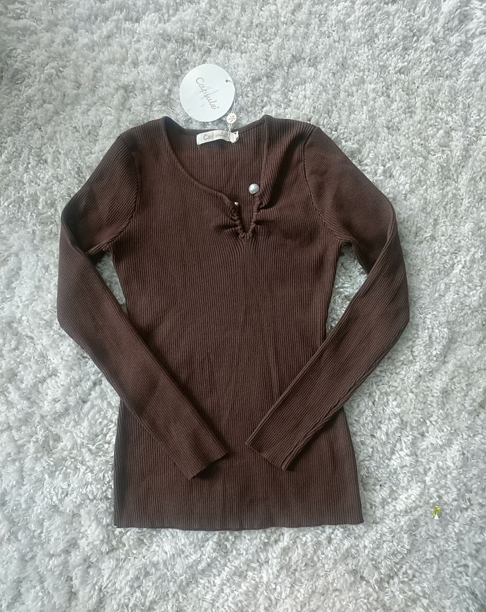 Pull capsule marron en taille M/L