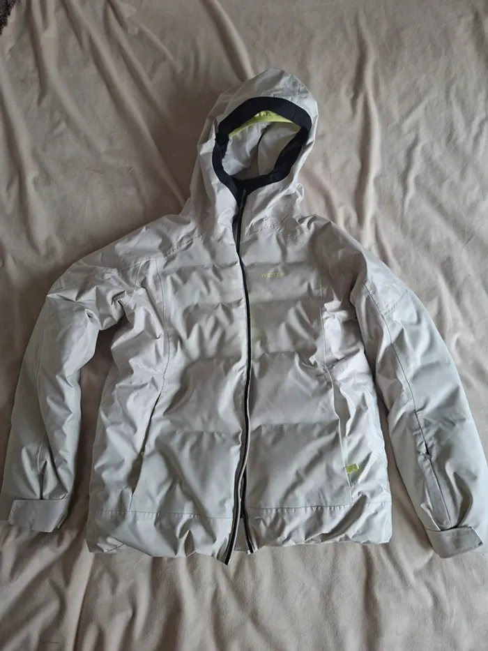 Manteau de ski, beige taille 14 ans, marque décathlon, nombreuses poches, ceinture d'étanchéité