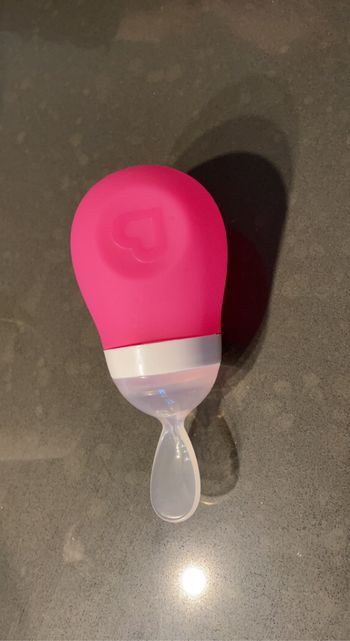Cuillère avec réservoir