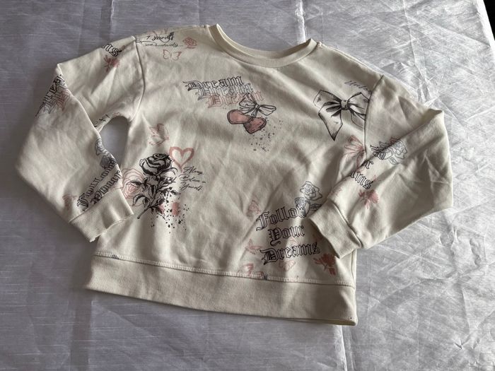 Sweat blanc cassé avec dessin