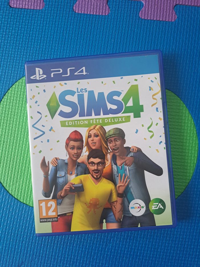 Jeu PS4 : Les Sims 4 – Édition fête Deluxe