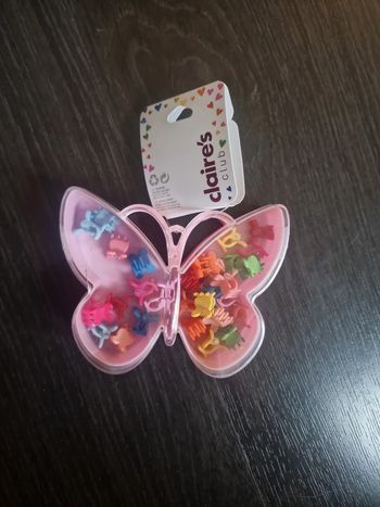 Boite pince à cheveux claire's