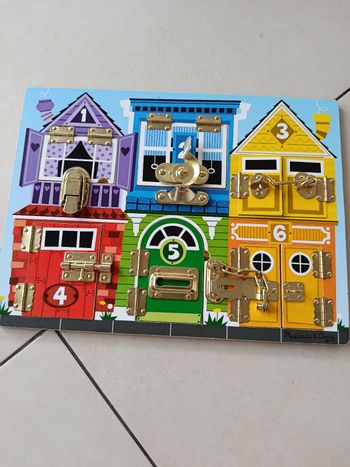Jouet planche à verrou