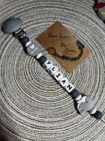 Attache tétine baleine