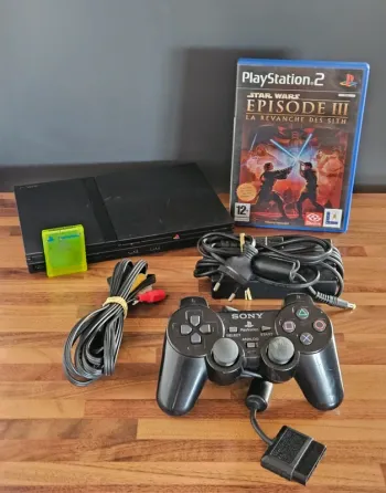 PlayStation 2 Slim + Carte 8 Mb et Jeu #
