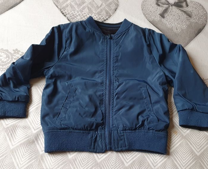 Blouson réversible de taille 5ans
