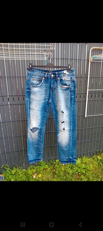 Jeans troué 