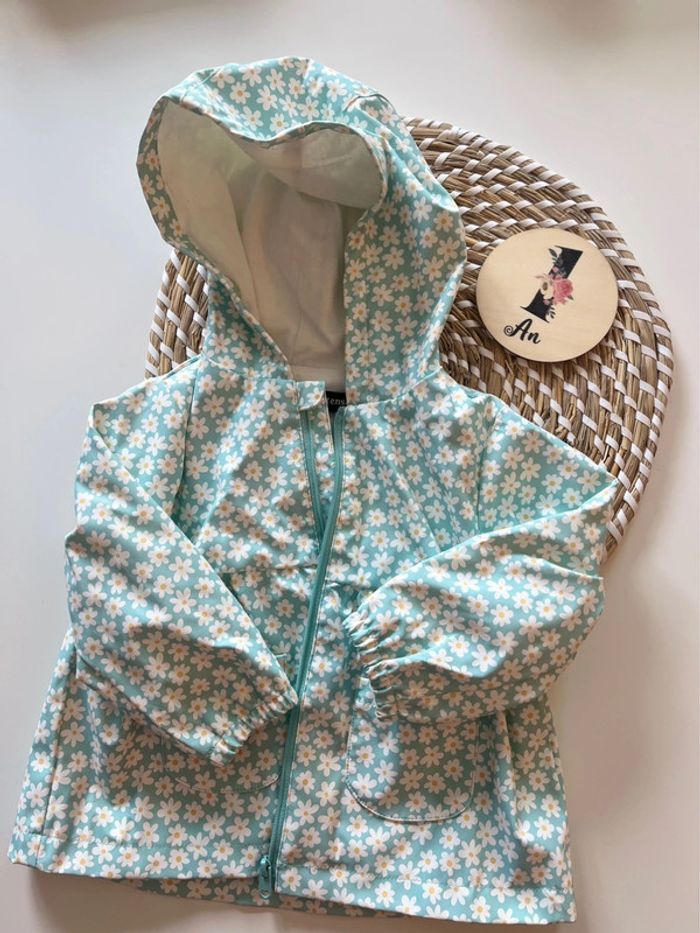 Manteau imperméable bleu à fleur - 12 mois