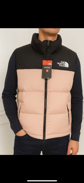 Doudou The north face M  homme femme sans manche neuf