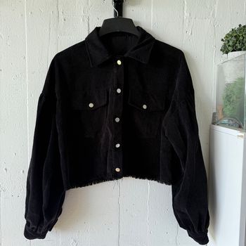 Veste velours noire à bords bruts  Manches amples bouffantes