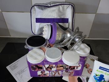 appareil de massage vibraluxe pro