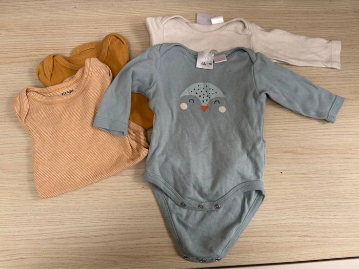 Lot 4 bodies manches longues taille 3 mois