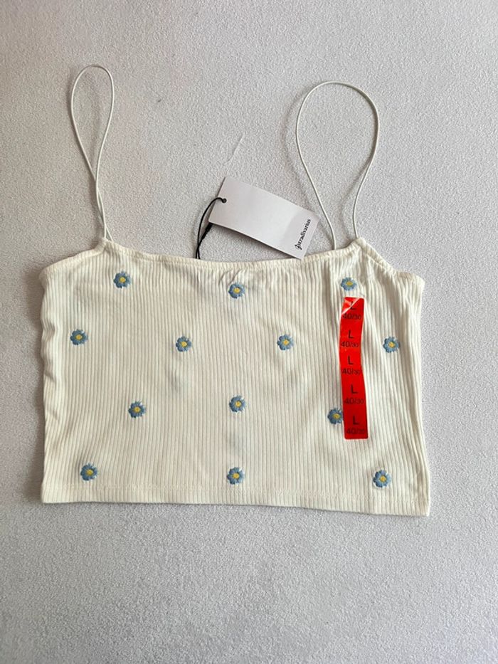 Débardeur côtelé blanc avec fleur Stradivarius L