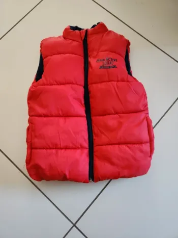 Doudoune sans manches taille 5/6ans
