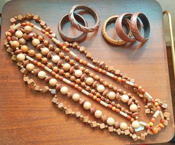 Lot bijoux vintage bois serpent colliers bracelets