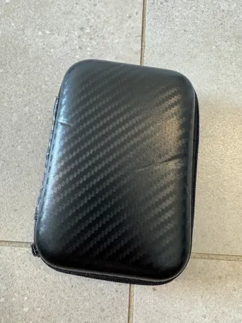 Petite pochette noire, très bon état, 9*13cm