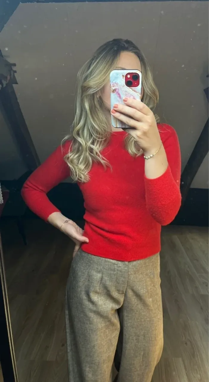 pull pur laine acheté dans une boutique vintage