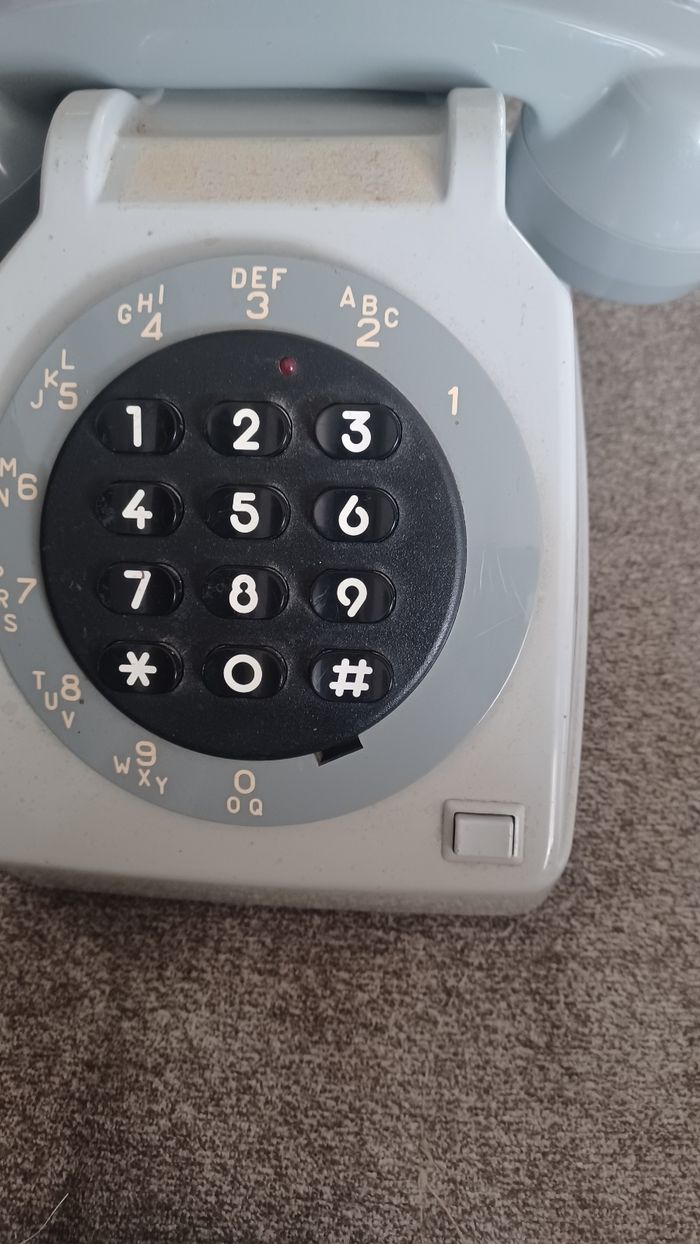 Téléphone fixe des années 60 gris marque telic bon etat - photo numéro 2