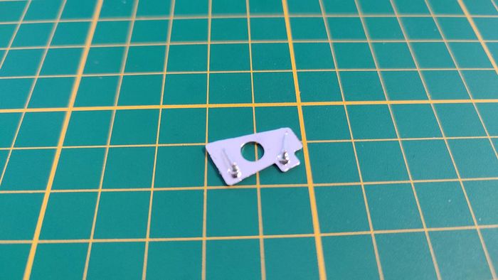 Poignée intérieure porte arrière gauche pièce miniature 1/18 Citroën traction 15cv 1952 Maisto #B36