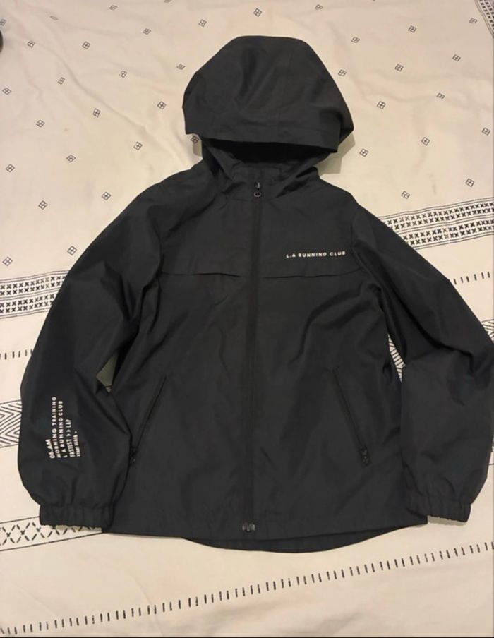 Coupe vent imperméable à capuche noir Kiabi 8ans - photo numéro 1