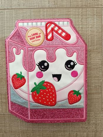Livre "mon livre qui sent bon lait fraise"