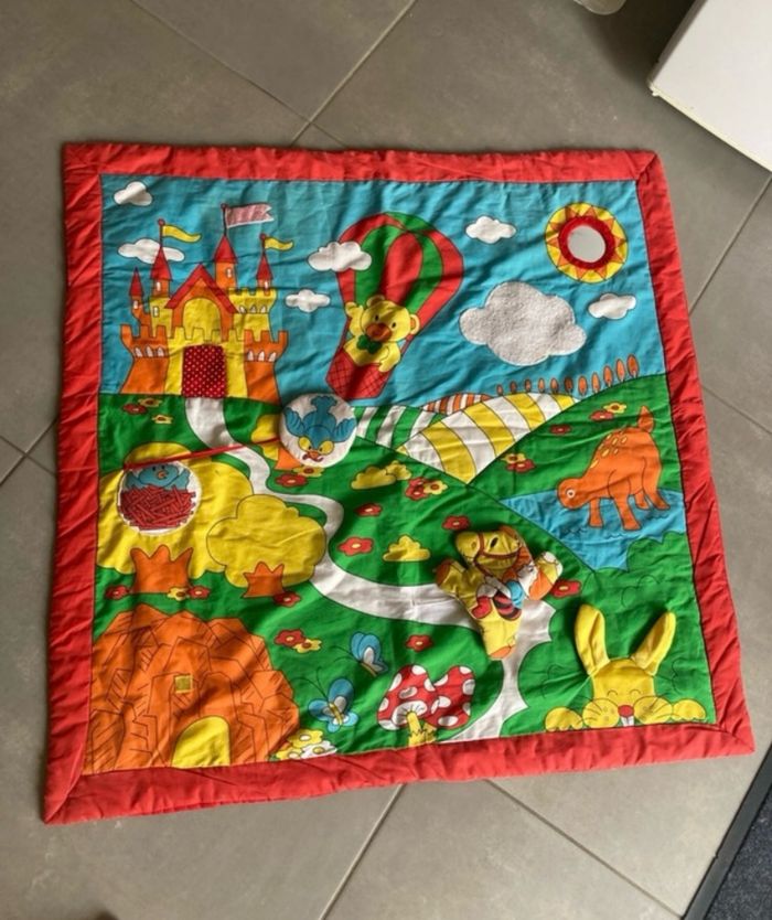 Tapis d’éveil avec jouets