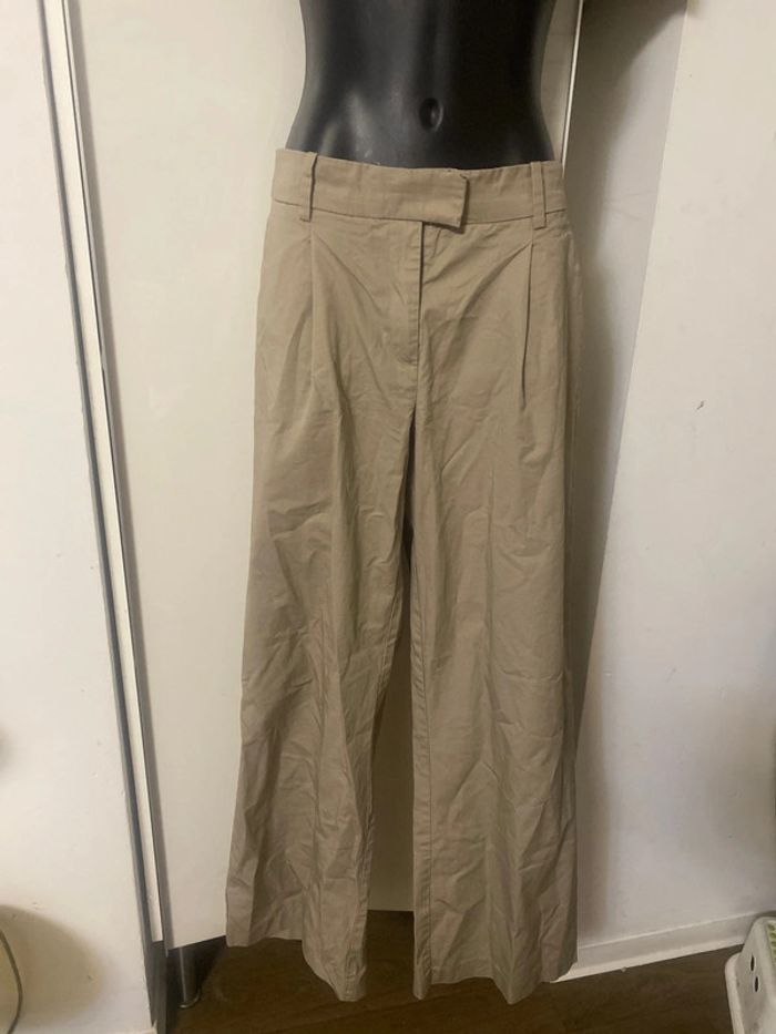 Pantalon à jambes large. Taille 38