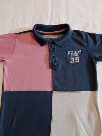 Polo manche courte avec colle voir photos avec écusson devant marquer rugby 35 marque tape à l'oeil taille 6 ans 116 cm voir photos