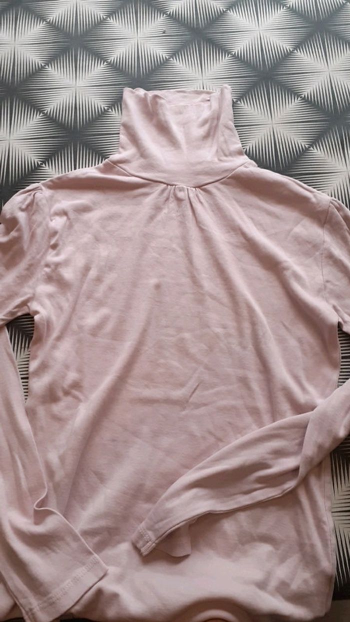 Col roulé rose clair