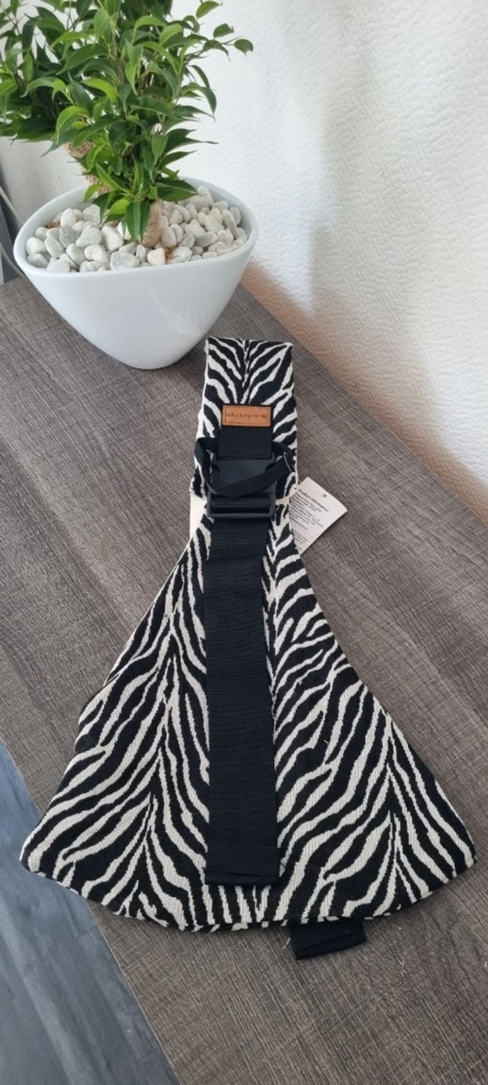 Très jolie porte bébé neuf (zebre) - photo numéro 2