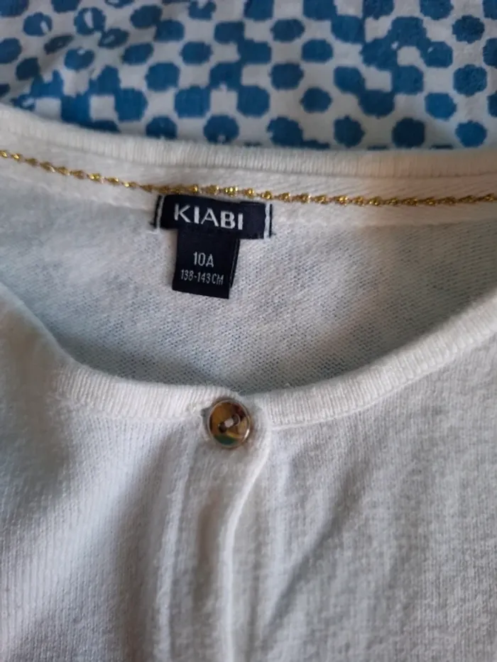 Gilet blanc Kiabi 10 ans - photo numéro 2