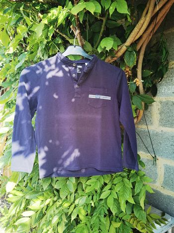 D828 polo bleu marine 10 ans