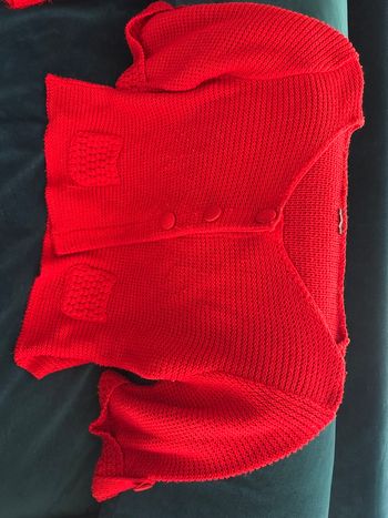 Gilet rouge avec trois pressions