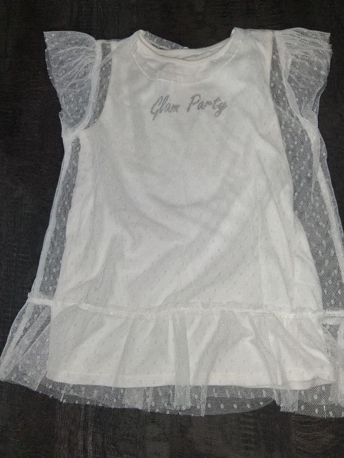 Robe à pois blanche avec doublure dentelle transparent