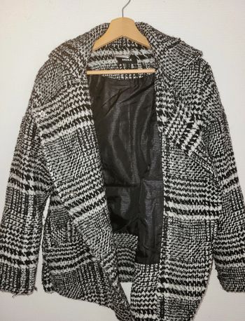 Manteau à carreaux noir
