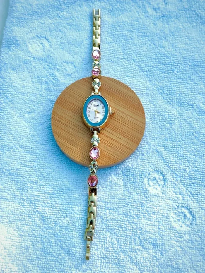 Montre bijou ovale rose & doré - photo numéro 3